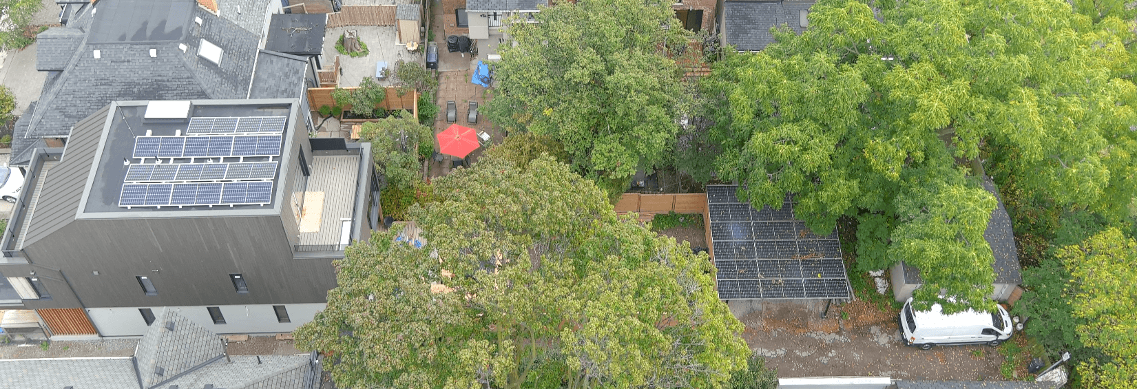 Solar panels on rooftop and solar covered carport by Bluewater Energy